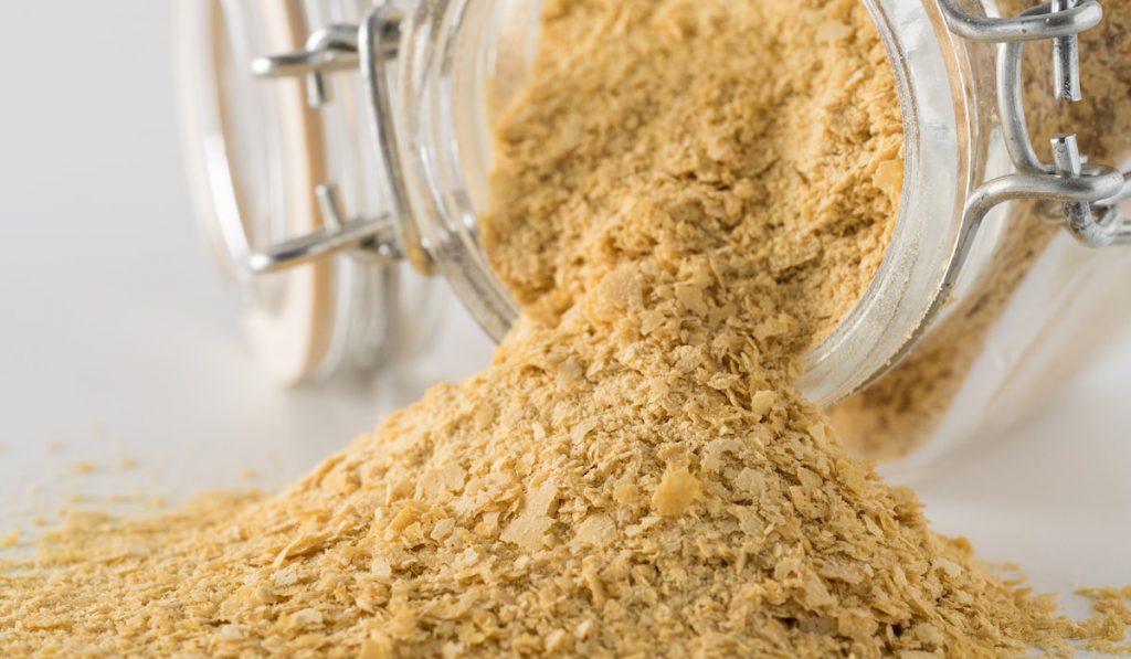Nutritional inactive yeast in glass jar 