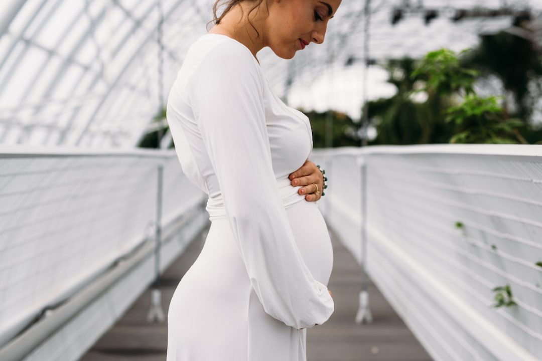 Why Do Pregnant Women Pose With Hands on Their Belly? Belly Bumps and